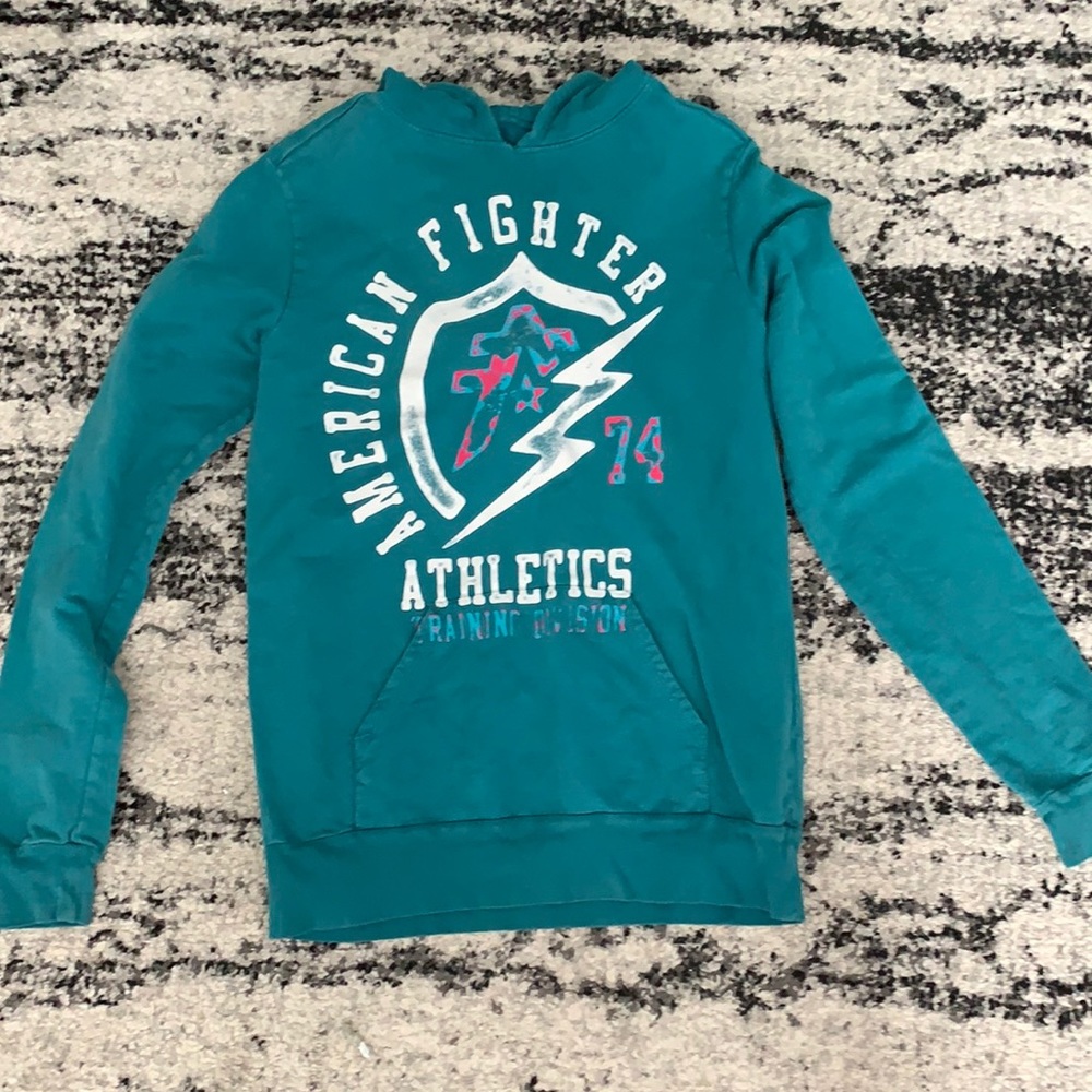 American fighter athletics sweatshirt.